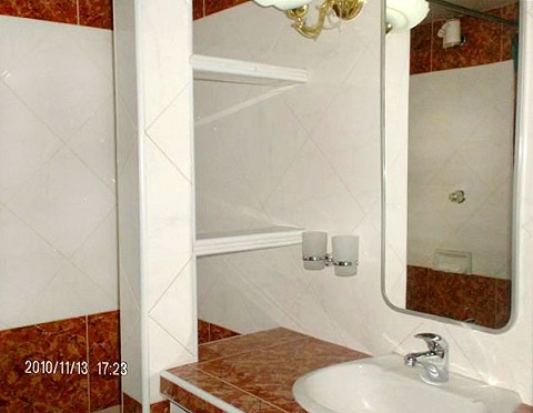 'Bathroom' is what you can see in this casa particular picture. Casas particulares are an alternative to hotels in Cuba. Check our website cuba-particular.com often for new casas.