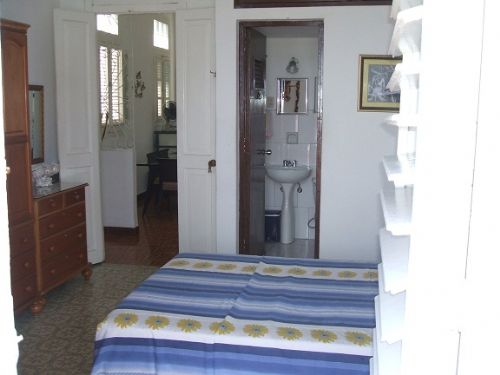 'Bedroom and Bathroom1' is what you can see in this casa particular picture. Casas particulares are an alternative to hotels in Cuba. Check our website cuba-particular.com often for new casas.