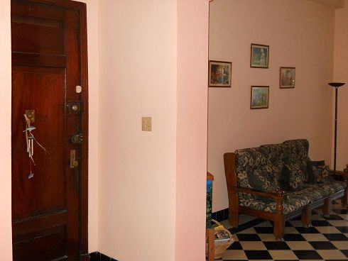 'Living room and entrance to the apartment' is what you can see in this casa particular picture. Casas particulares are an alternative to hotels in Cuba. Check our website cuba-particular.com often for new casas.