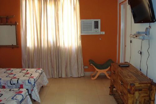 'Room1.2' is what you can see in this casa particular picture. Casas particulares are an alternative to hotels in Cuba. Check our website cuba-particular.com often for new casas.