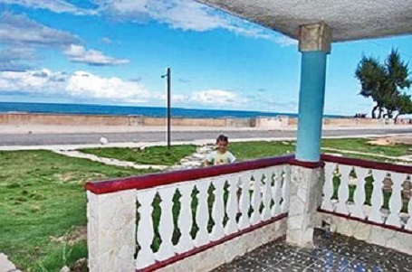 'View from portal' is what you can see in this casa particular picture. Casas particulares are an alternative to hotels in Cuba. Check our website cuba-particular.com often for new casas.