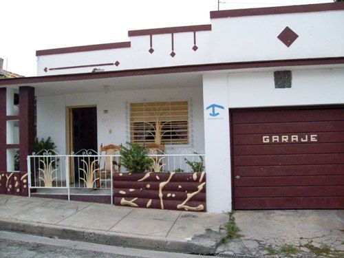 'garage' Casas particulares are an alternative to hotels in Cuba. Check our website cubaparticular.com often for new casas.