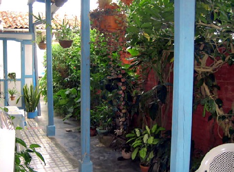 'Outside Hall and Courtyard' is what you can see in this casa particular picture. Casas particulares are an alternative to hotels in Cuba. Check our website cuba-particular.com often for new casas.