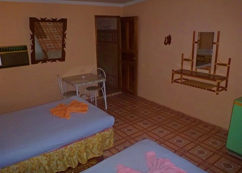 'Habitacion 1' is what you can see in this casa particular picture. Casas particulares are an alternative to hotels in Cuba. Check our website cuba-particular.com often for new casas.