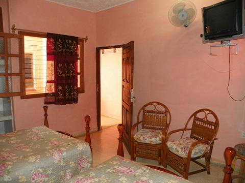 'Habitacion 1' is what you can see in this casa particular picture. Casas particulares are an alternative to hotels in Cuba. Check our website cuba-particular.com often for new casas.