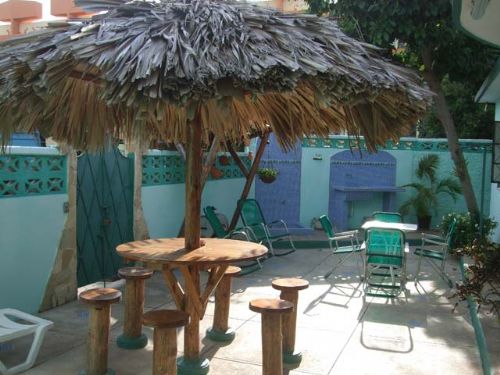 'Back Yard' is what you can see in this casa particular picture. Casas particulares are an alternative to hotels in Cuba. Check our website cuba-particular.com often for new casas.