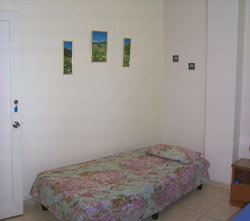 'The other bed in the room' is what you can see in this casa particular picture. Casas particulares are an alternative to hotels in Cuba. Check our website cuba-particular.com often for new casas.