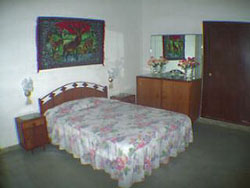 'Bedroom' is what you can see in this casa particular picture. Casas particulares are an alternative to hotels in Cuba. Check our website cuba-particular.com often for new casas.